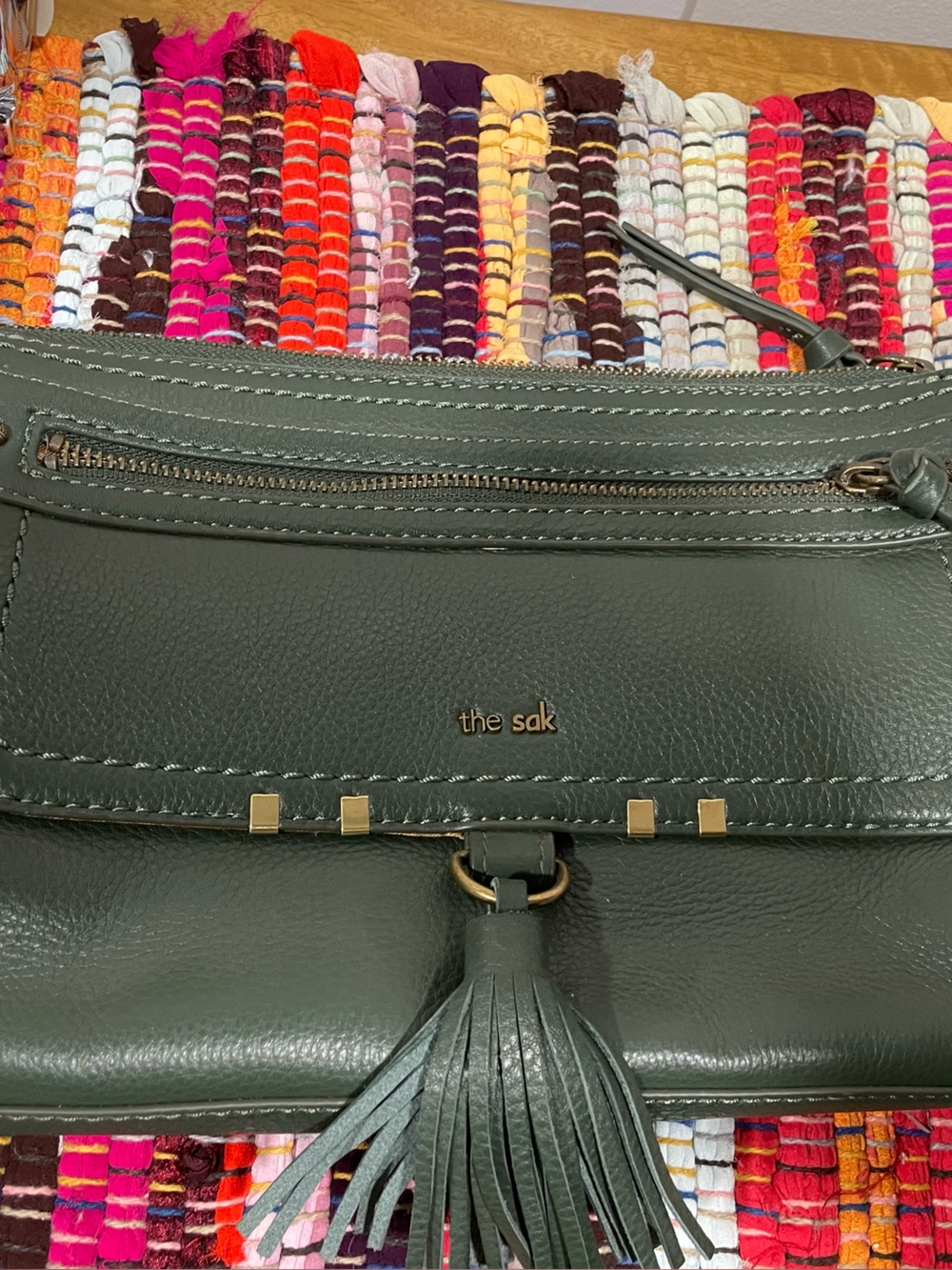 The Sak Dark Olive Green Leather Tassel Wristlet Clutch